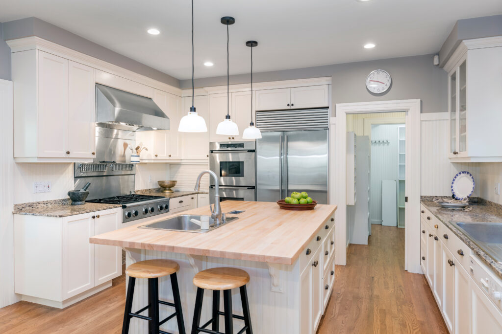 Luxury Kitchen Interior in white with wooden floor