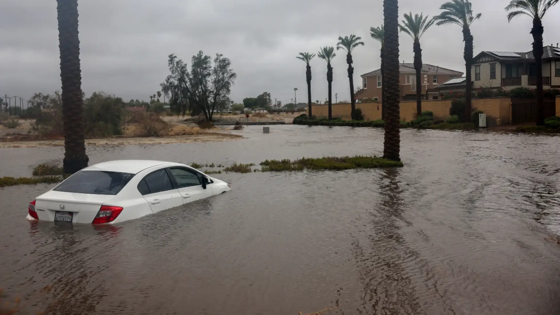 Car stranded in flash-flood water on a Las Vegas street during a monsoon storm