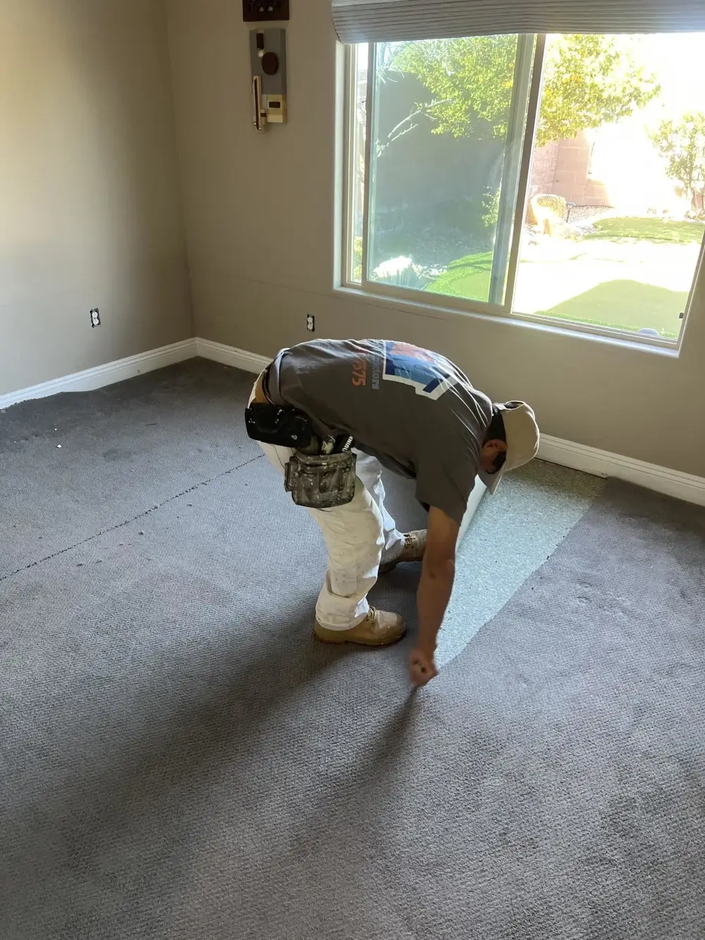 M&M Restoration technician restores water-damaged carpet in a Summerlin home